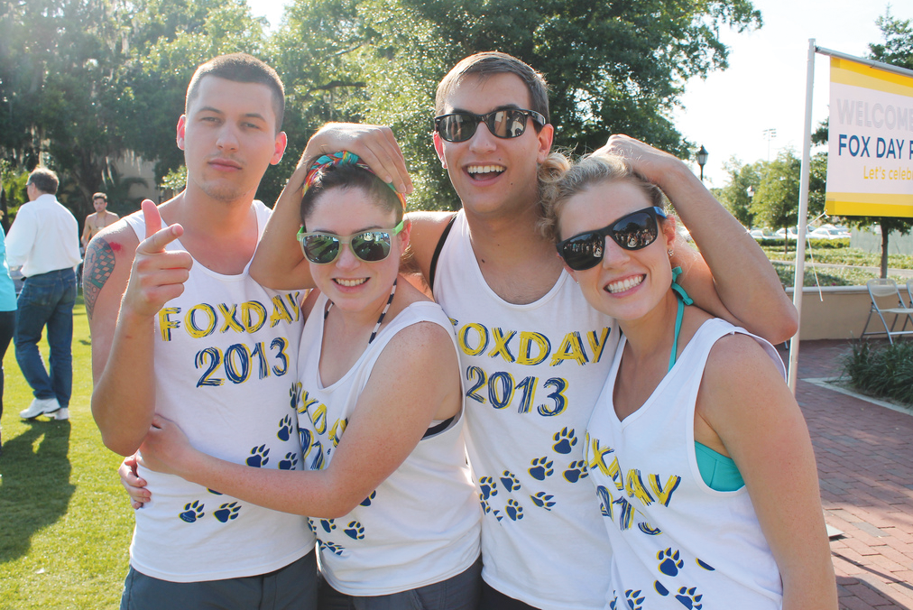 Students pose at the 2013 Fox Day Picnic. The picnic brings all members of the Rollins community together to enjoy delicious cook-out fare on the lawn.